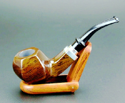 a wooden pipe in a holder